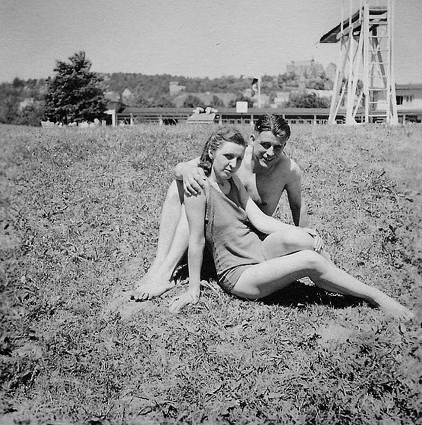 An off-duty Wehrmacht soldier enjoying a leisurely day at the pool with his local girlfriend, a sign of integrated social life. An off-duty Wehrmacht soldier enjoying a leisurely day at the pool with his local girlfriend, a sign of integrated social life.