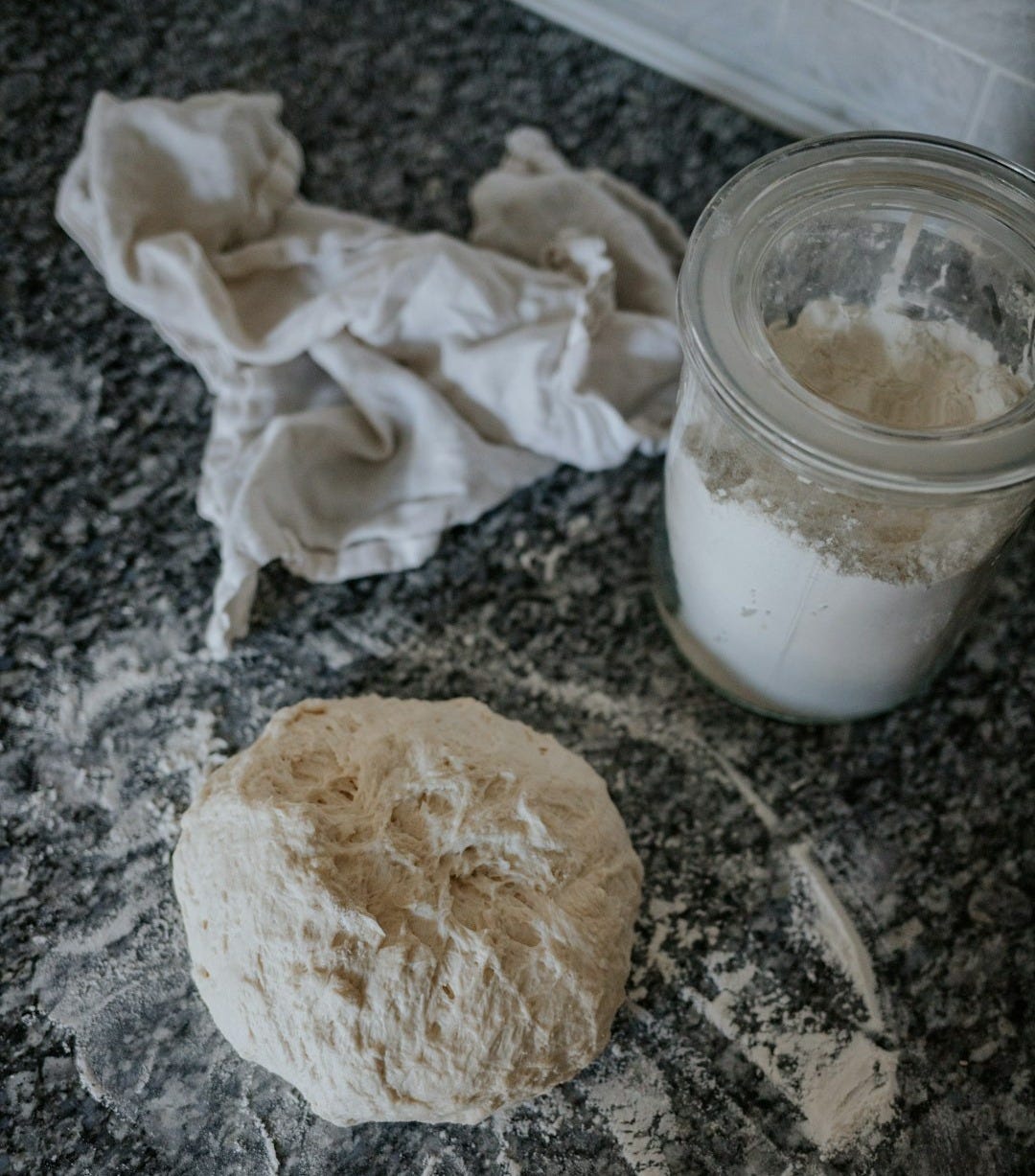 white powder in clear glass jar