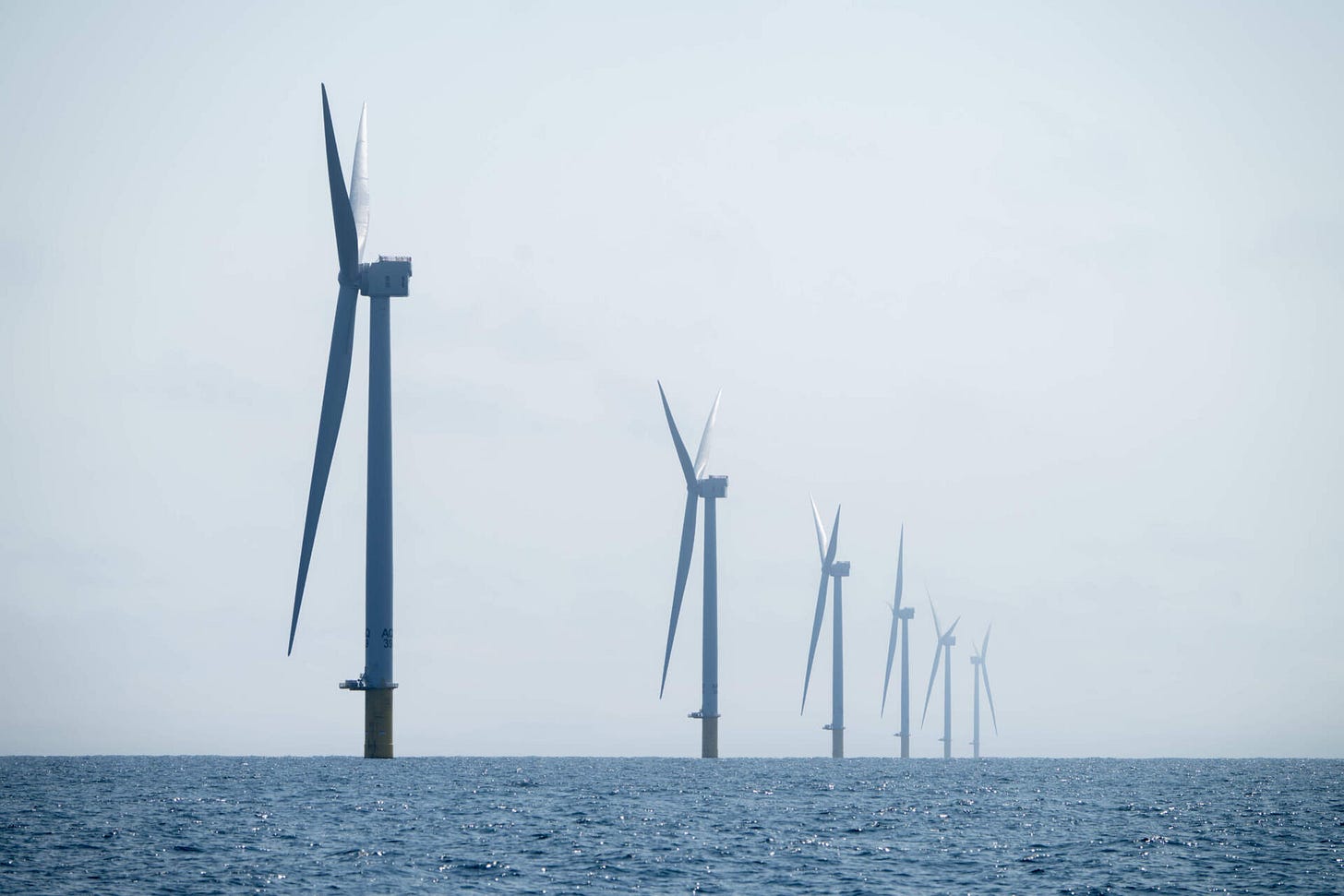 A row of turbines in the Vineyard Wind project near Martha's Vineyard. (Raquel C Zaldívar/New England News Collaborative) A row of turbines in the Vineyard Wind project near Martha's Vineyard. (Raquel C Zaldívar/New England News Collaborative)