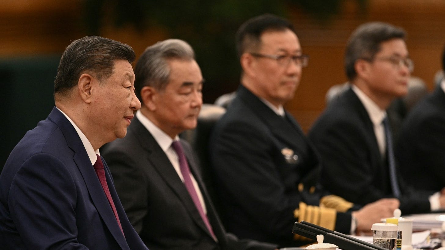 Xi Jinping in leadership meeting — Chinese President during high-level bilateral discussions, symbolizing centralized governance and policy continuity.