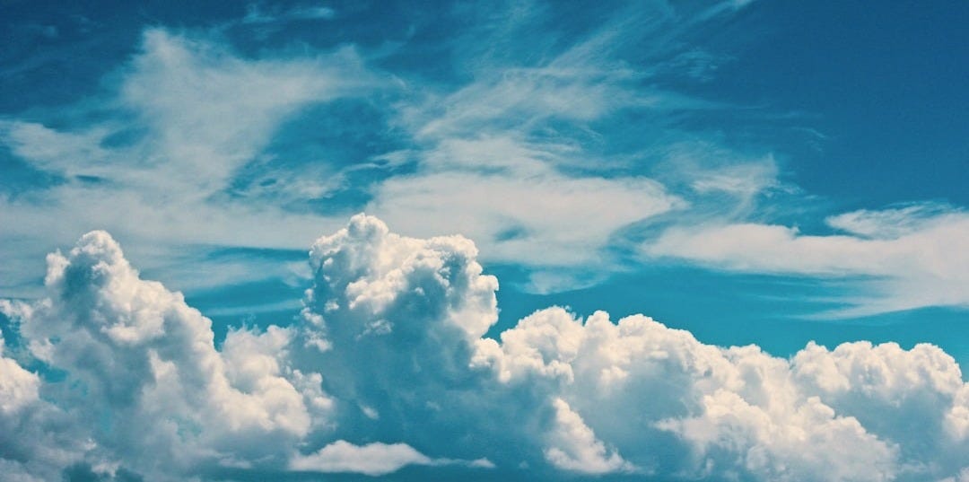 white clouds under blue sky at daytime