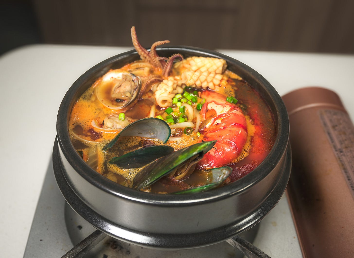 seafood stew filled to the brim