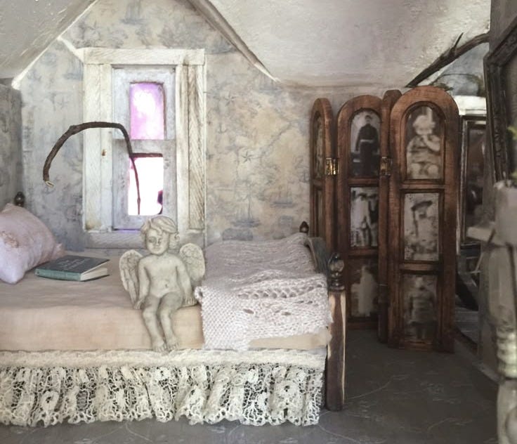 This may contain: a doll house with a bed, dresser and other furniture in the room that looks like it is made out of wood