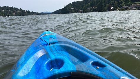 Waterfall, kayak in a lake, rapids along a river