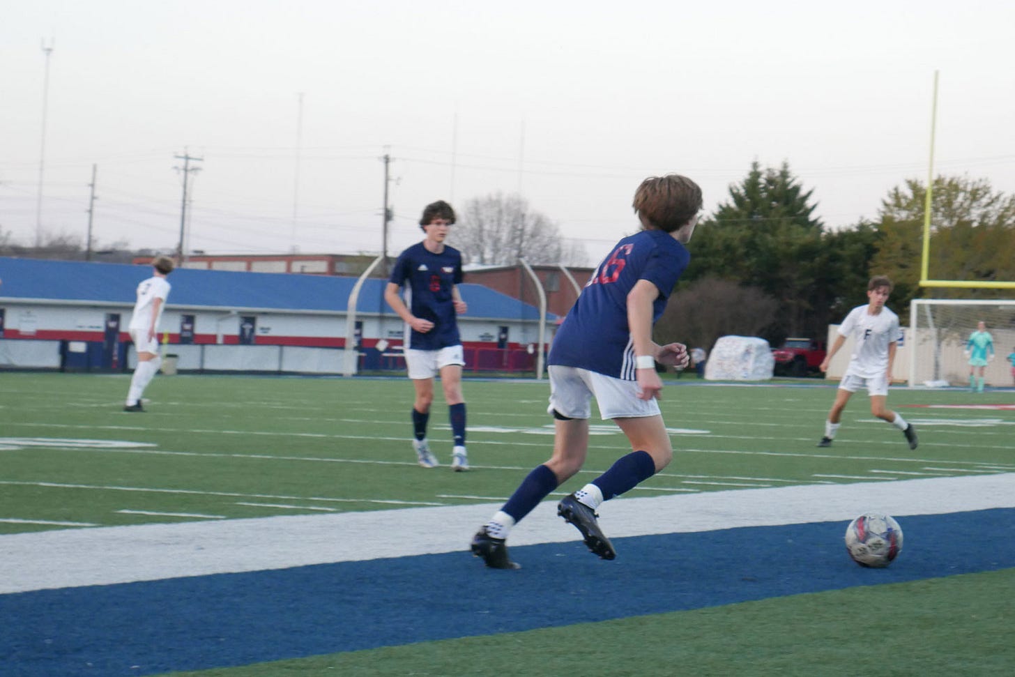 West High player dribbles a soccer ball