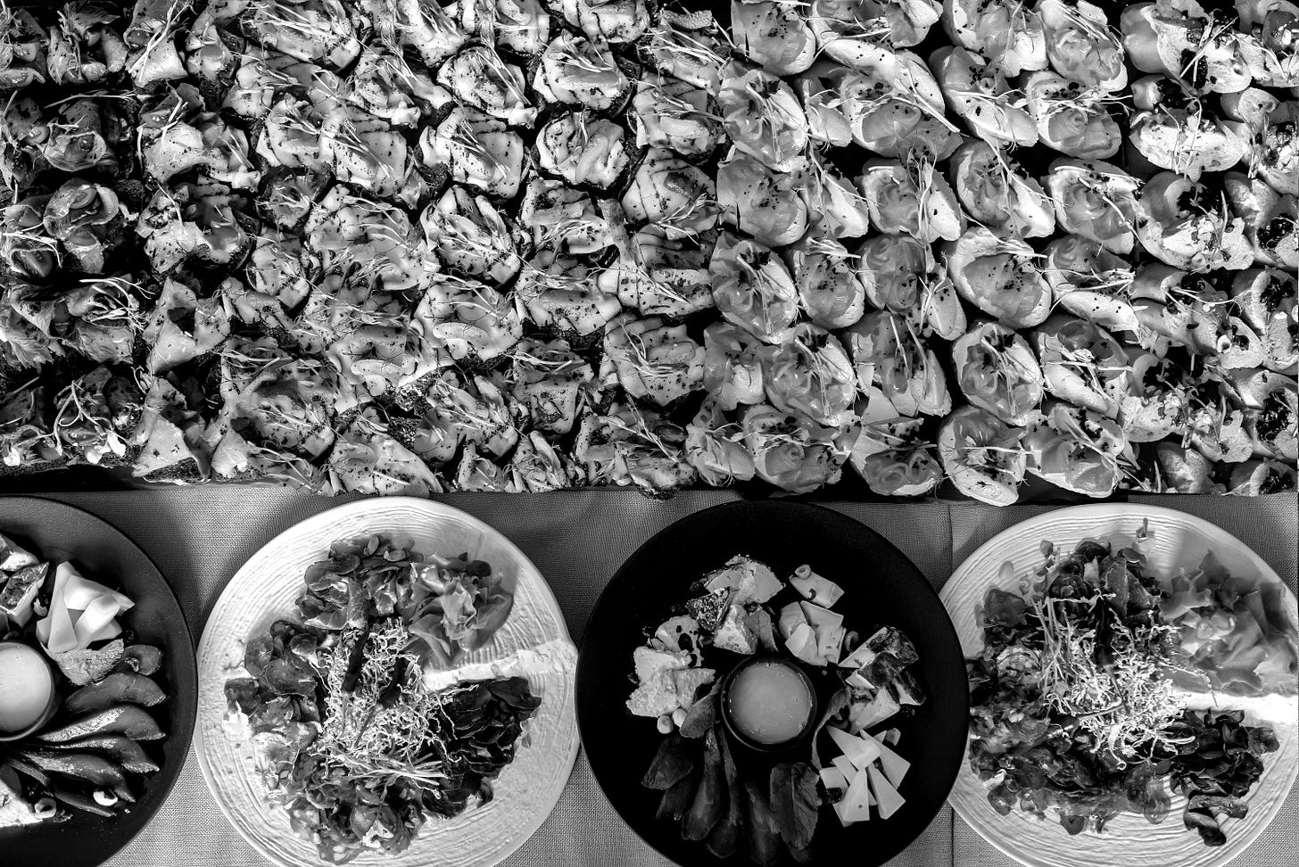 Delicious appetizers and small plates are displayed. Delicious appetizers and small plates are displayed.