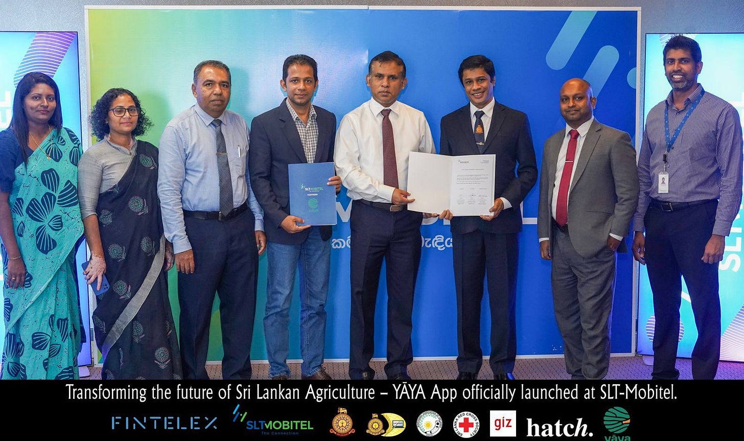 May be an image of one or more people, newsroom, dais and text that says "и ක ඳිය Transforming the future of Sri Lankan Agriculture FINTELEX SLTMOBITEL LTMOBITEL YÃYA App officially launched at SLT-Mobitel. SLT- hatch. giz" May be an image of one or more people, newsroom, dais and text that says "и ක ඳිය Transforming the future of Sri Lankan Agriculture FINTELEX SLTMOBITEL LTMOBITEL YÃYA App officially launched at SLT-Mobitel. SLT- hatch. giz"