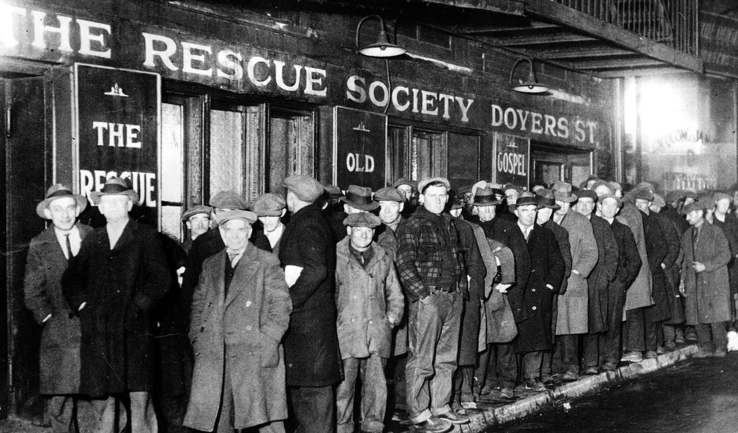 Great Depression photo. Men in long line waiting in front of a rescue mission.