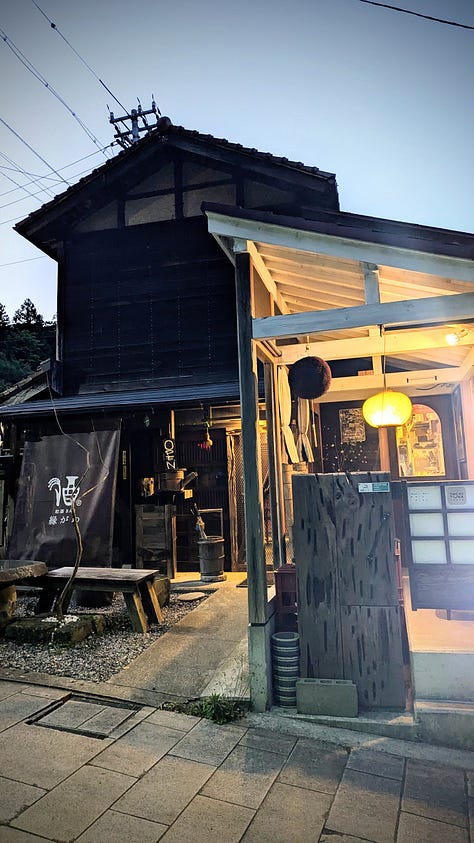 Japanese-style rooms, bowls of food, and bottles of sake.
