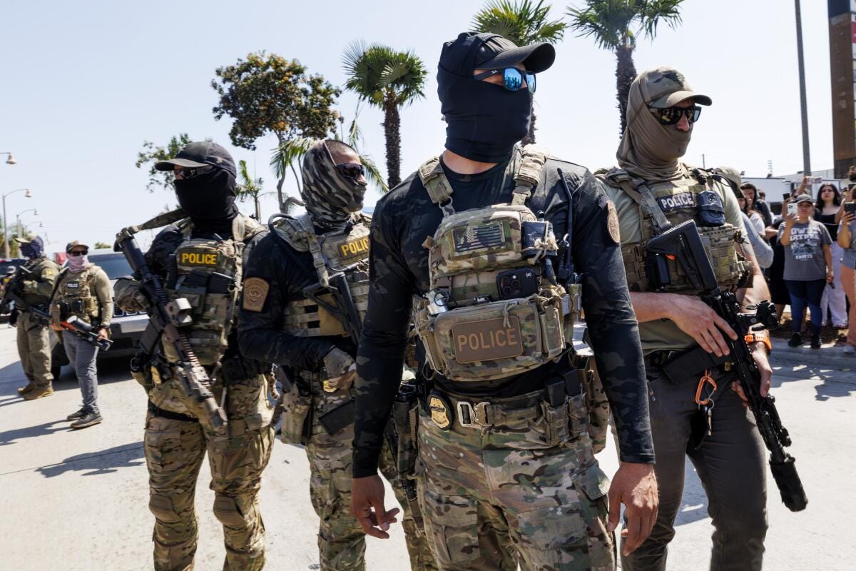 Who are these people?' Masked immigration agents challenge local police,  sow fear in L.A. - Los Angeles Times