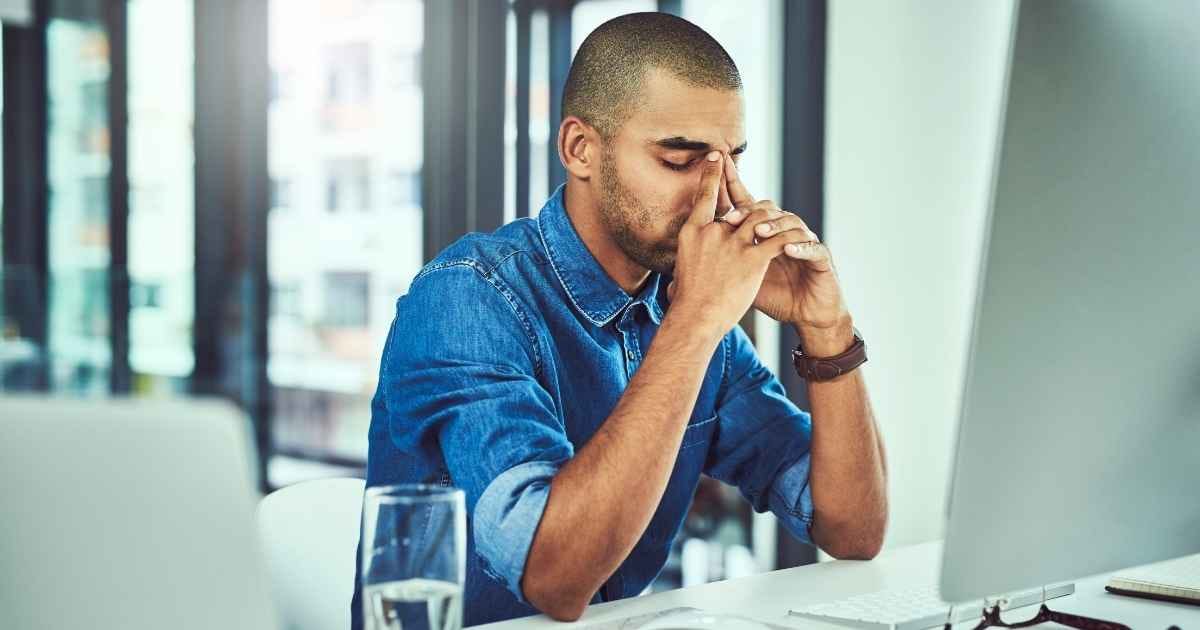 Businessman looking a computer screen, stressed!