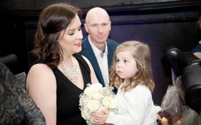 Lucy, Ray and their daughter during better times