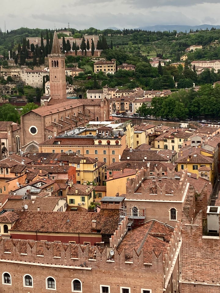 Photo of campers lined up in a mostly bare lot, and scenic image of rooftops of Verona's old quarter.