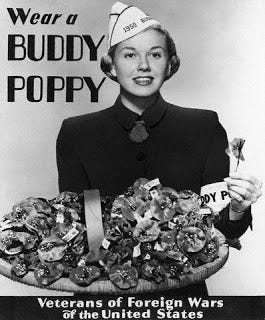 This may contain: a woman holding a basket filled with lots of candies in it's hands