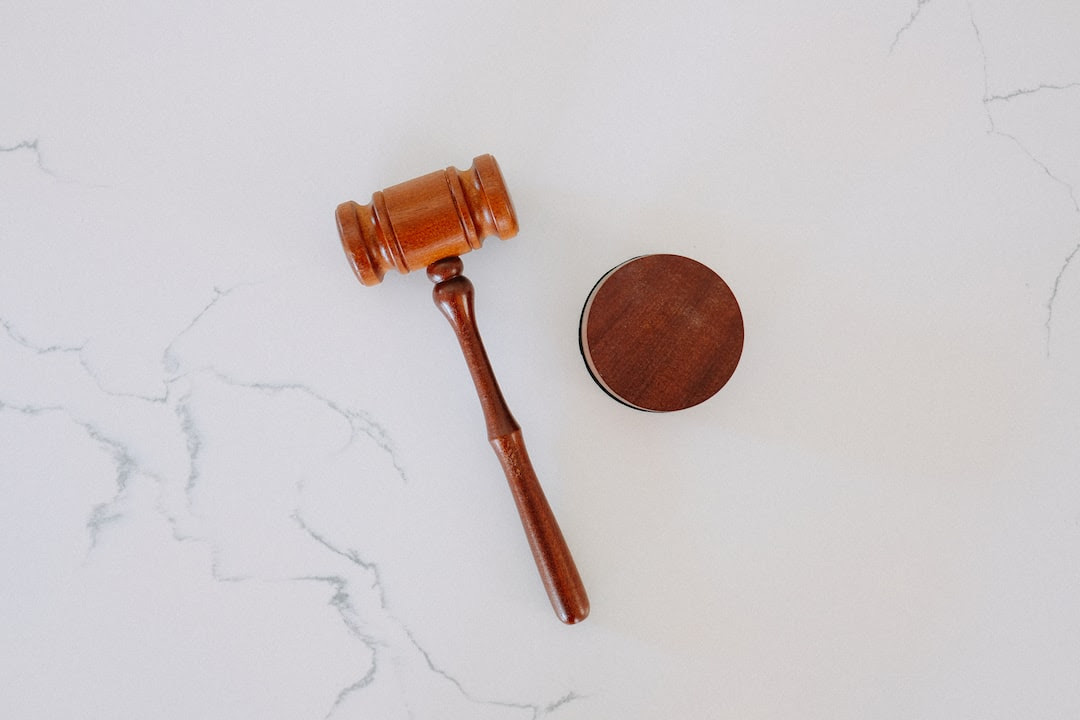 brown wooden smoking pipe on white surface brown wooden smoking pipe on white surface