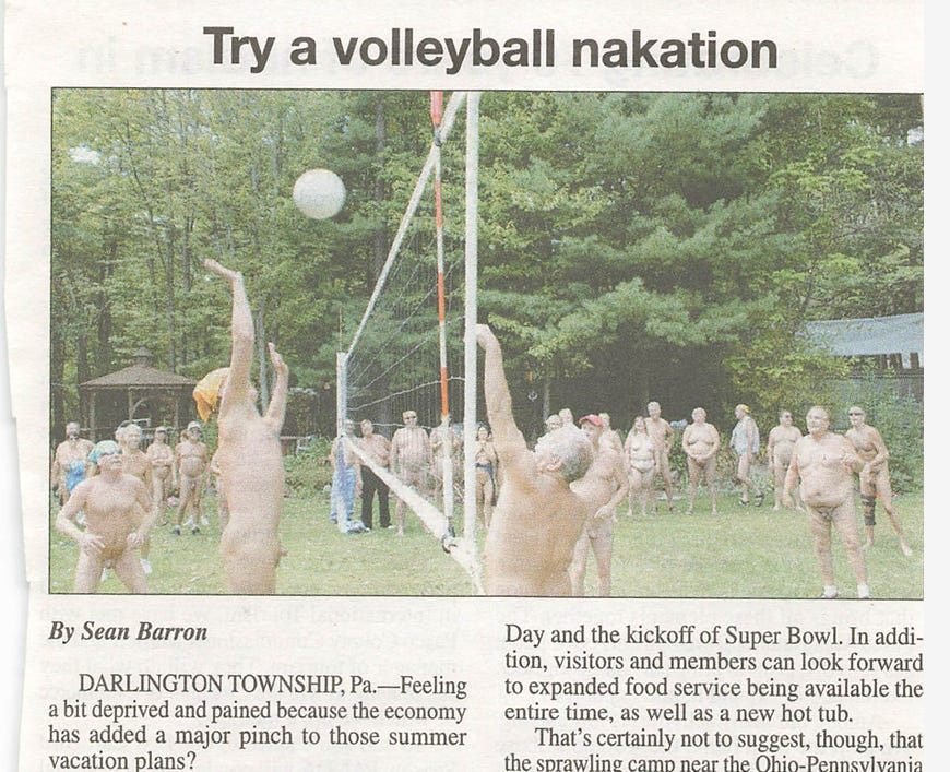 Newspaper clipping titled “Try a volleyball nakation” showing a nude volleyball match at White Thorn Lodge. Players leap and reach for the ball at the net while a crowd of nude spectators watches in the background amid trees and cabins. Newspaper clipping titled “Try a volleyball nakation” showing a nude volleyball match at White Thorn Lodge. Players leap and reach for the ball at the net while a crowd of nude spectators watches in the background amid trees and cabins.