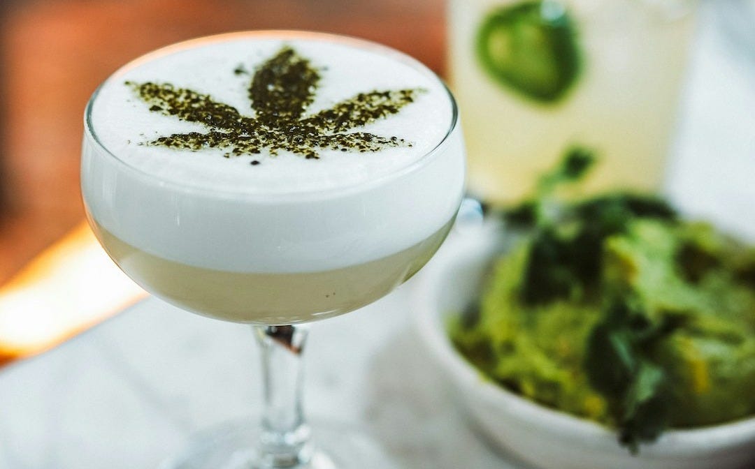 wine glass with cannabis leaf decor wine glass with cannabis leaf decor