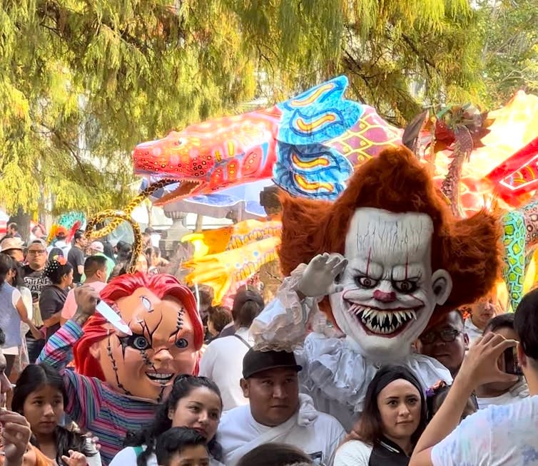 Hollywood horror movie images at Day of the Dead festivity in Mexico City.