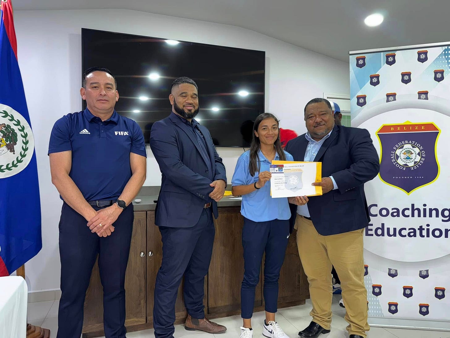 May be an image of 4 people and text that says 'FIFA HELIZE 1 Coaching Educatior' May be an image of 4 people and text that says 'FIFA HELIZE 1 Coaching Educatior'