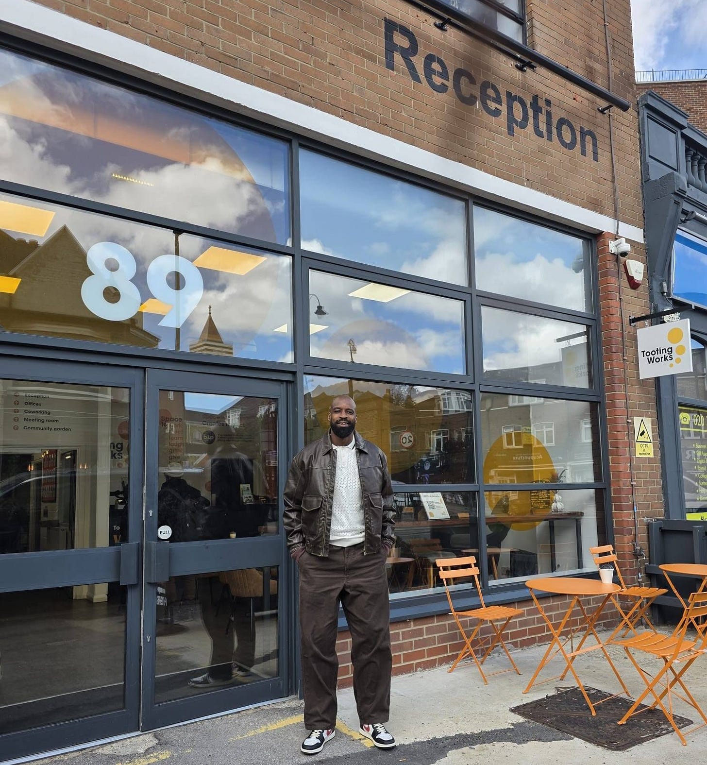 May be an image of 2 people and text