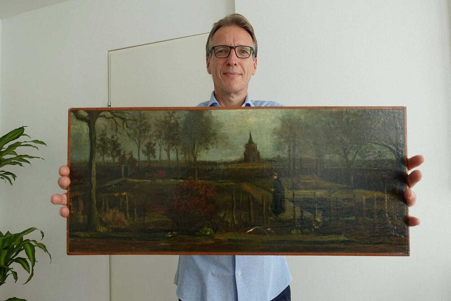 Dutch Detective Arthur Brand Holds stolen painting from Van Gogh "The Parsonage Garden at Huen in Spring" Dutch Detective Arthur Brand Holds stolen painting from Van Gogh "The Parsonage Garden at Huen in Spring"