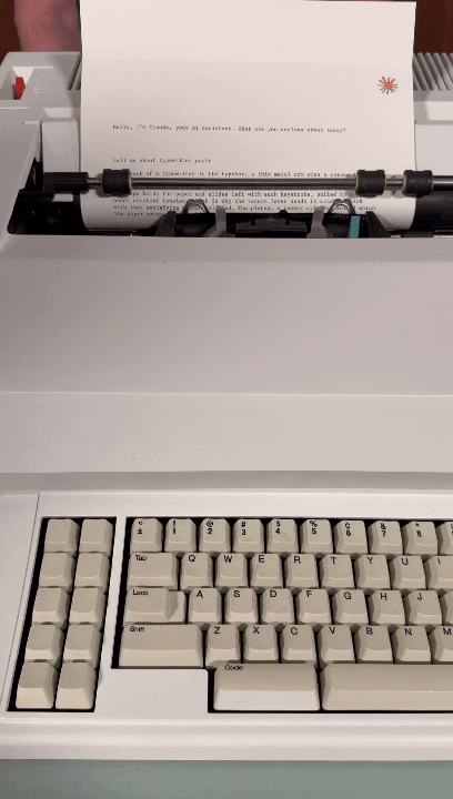 Claude-powered IBM Wheelwriter typewriter typing a live response onto paper during a demo at Code with Claude 2026. Claude-powered IBM Wheelwriter typewriter typing a live response onto paper during a demo at Code with Claude 2026.