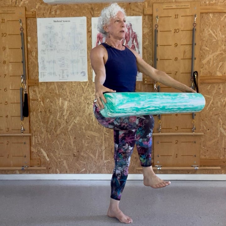 four photos of a woman standing on one leg with either a foam roller or mat as a prop