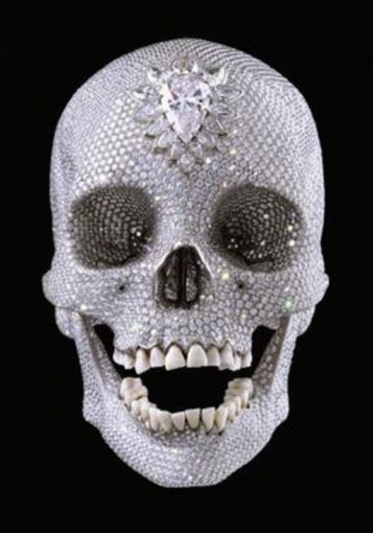 Diamond encrusted platinum skull sculpture Diamond encrusted platinum skull sculpture