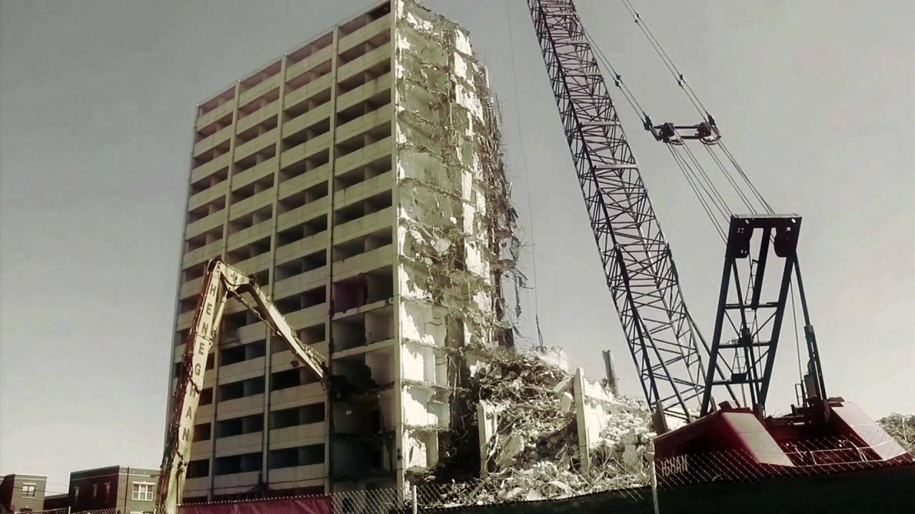 A pair of cranes tear down a building in the old Cabrini-Green housing project in Chicago.