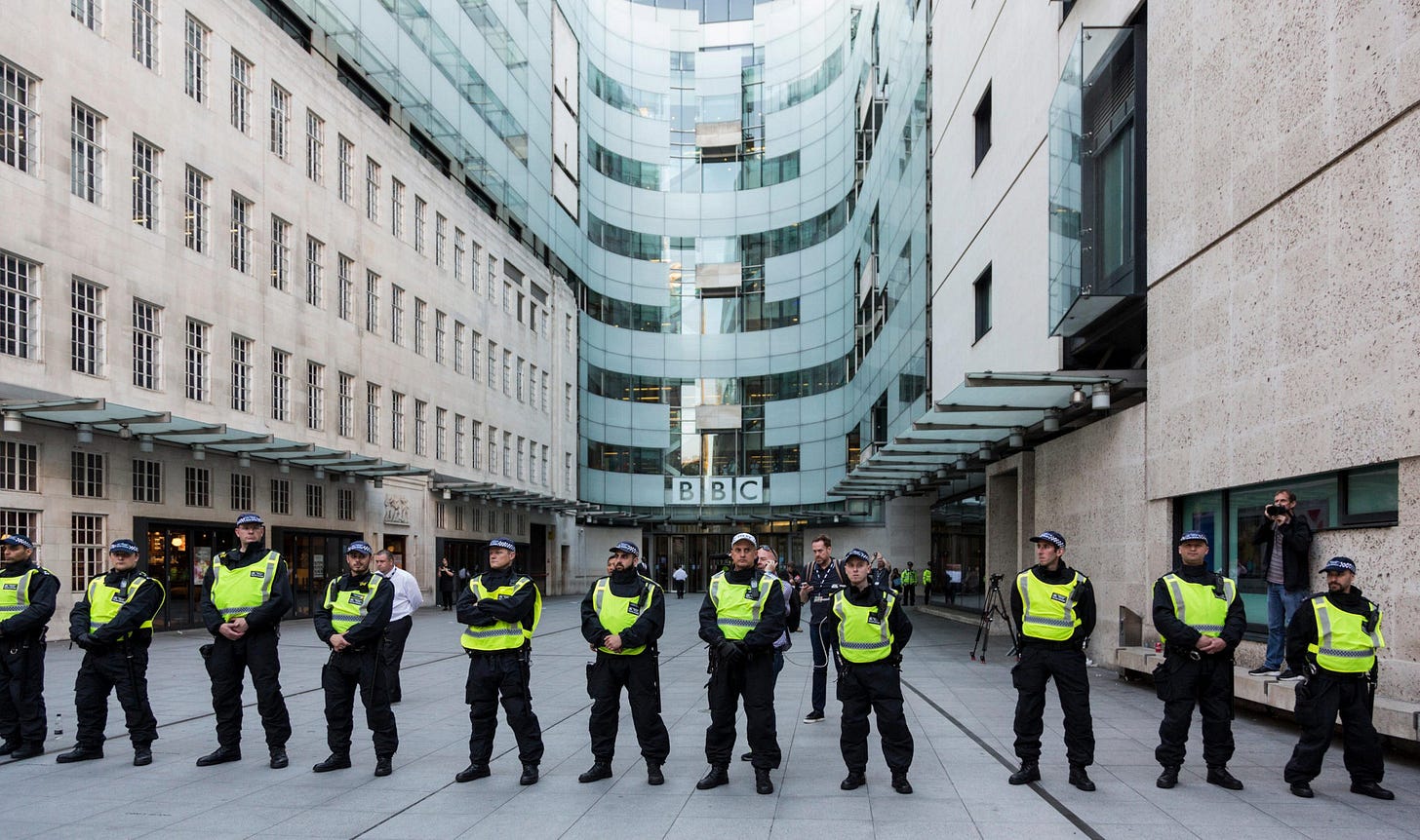 A protest outside the BBC. (Photo: Bettina Strenske / Alamy) Police outside the BBC. (Photo: Bettina Strenske / Alamy)