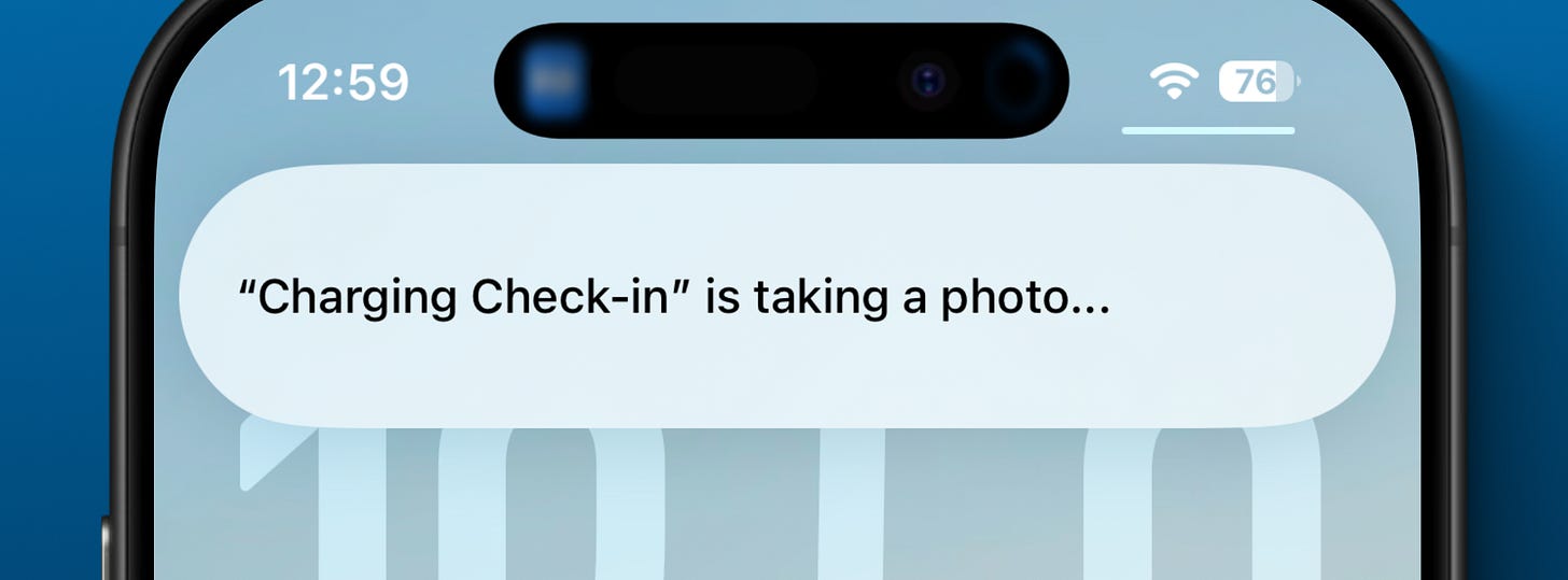 iPhone notification showing that the "Charging Check-in" automation is taking a photo, indicating background camera access is visible to the user.