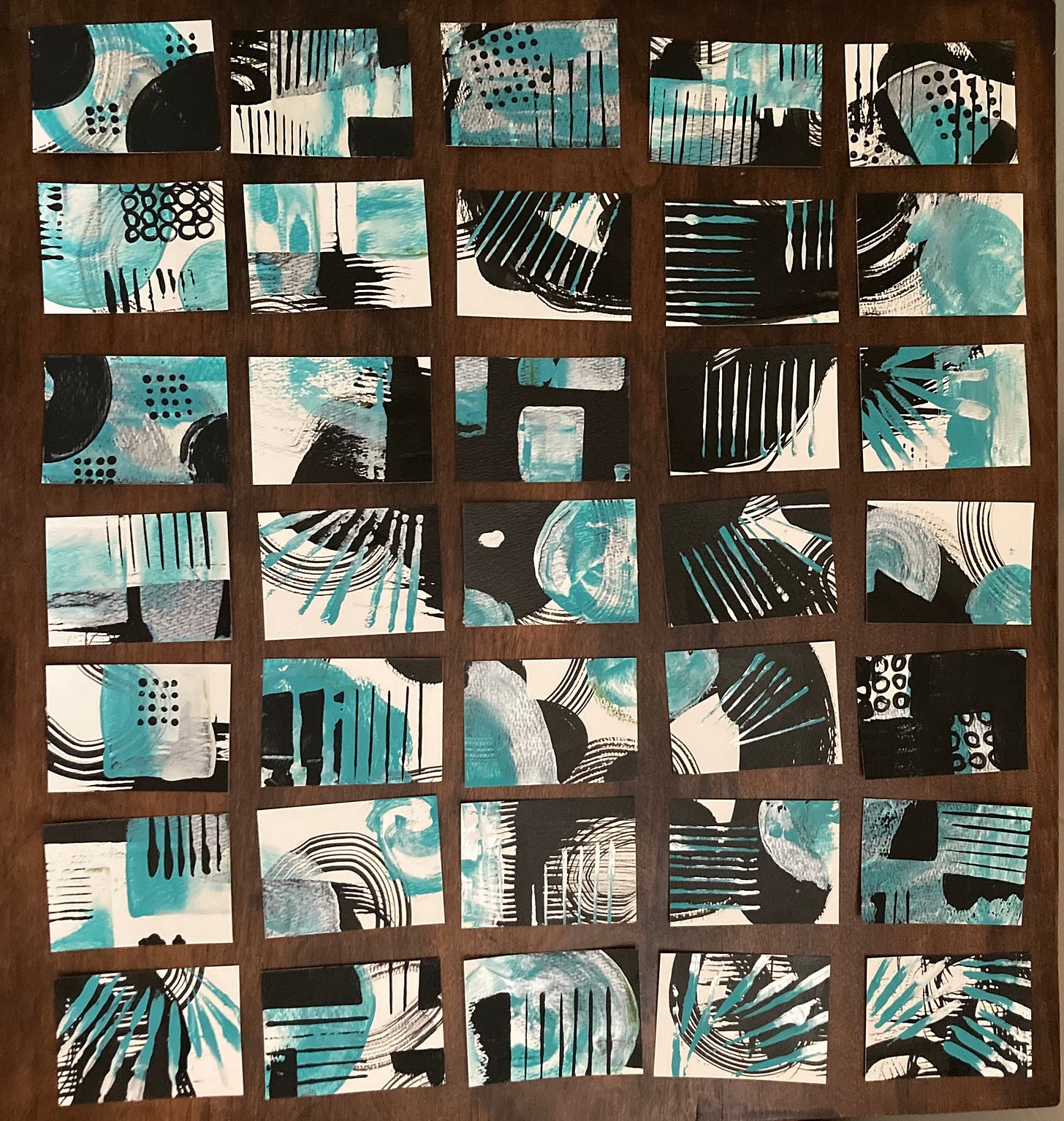 35 3.5 inch x 2.5 inch papers with turquoise, black, and metallic in abstract forms 35 3.5 inch x 2.5 inch papers with turquoise, black, and metallic in abstract forms