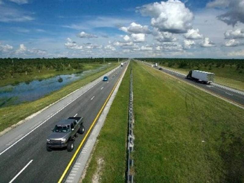 http://floridapolitics.com/wp-content/uploads/2015/11/alligator_alley-fence-Panthers-e1447028993295.jpg