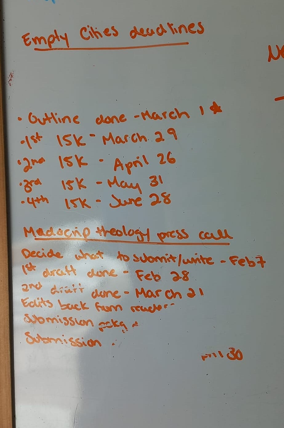 A whiteboard scrawl of upcoming deadlines