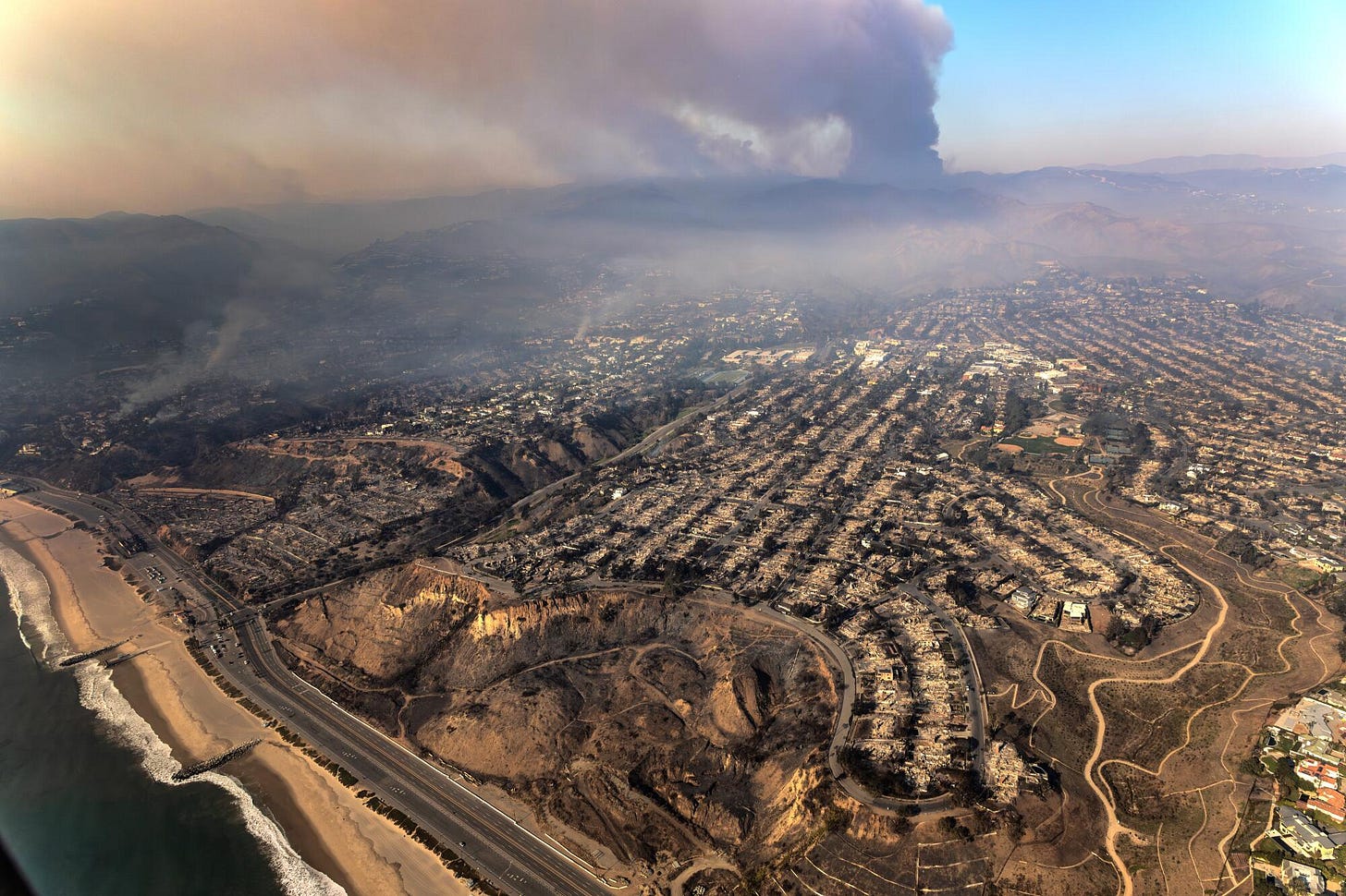 Aerial view of a neighborhood destroyed by the Palisades fire. Aerial view of a neighborhood destroyed by the Palisades fire.