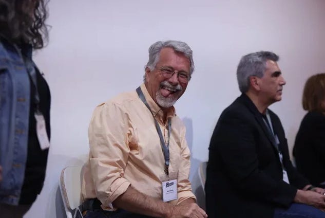 Meghan Daum hosting an Unspeakeasy retreat weekend in New York City with attendees in conversation around a table