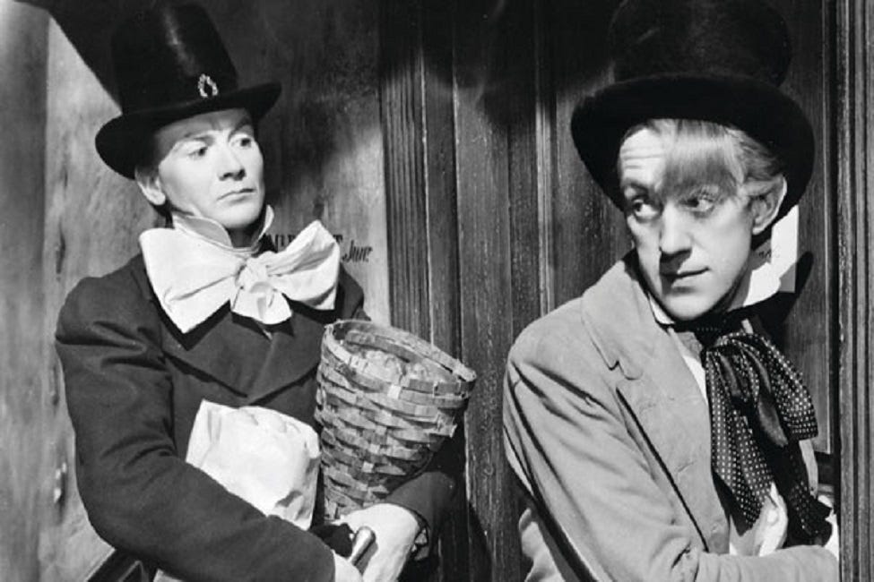 Jon Mills and Alec Guinness in period costume Jon Mills and Alec Guinness in period costume