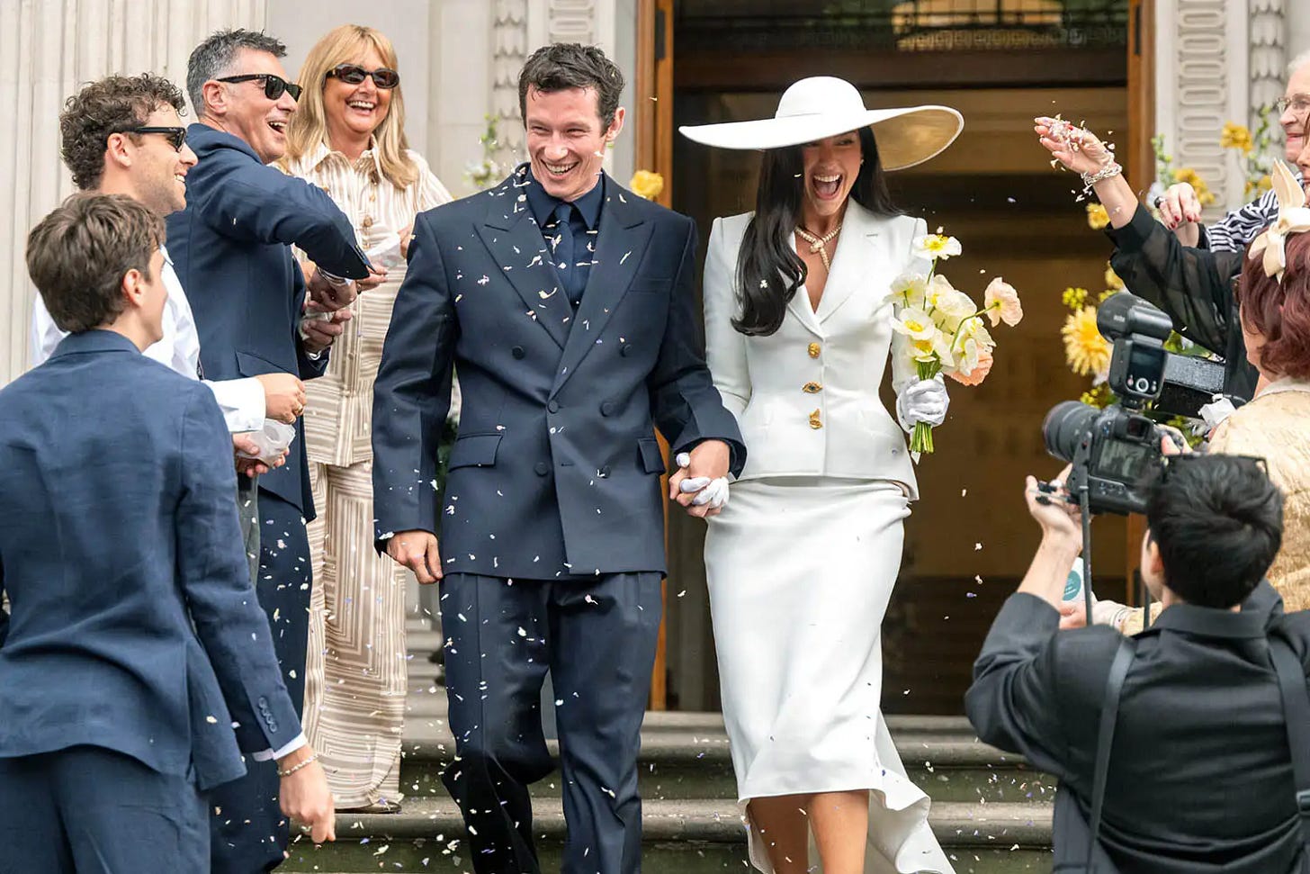 IT was a modest - but very stylish - start to married life. Pop star Dua Lipa tied the knot with actor Callum Turner at a low-key register office ceremony before being driven away in a black London cab. 