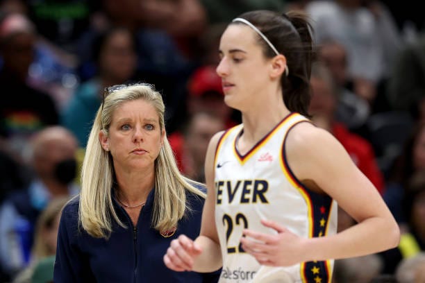 Head coach Christie Sides of the Indiana Fever looks toward Caitlin Clark during the first quarter against the Seattle Storm at Climate Pledge Arena...