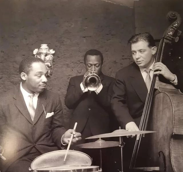 Kenny Clarke and Miles Davis - by Vinnie Sperrazza