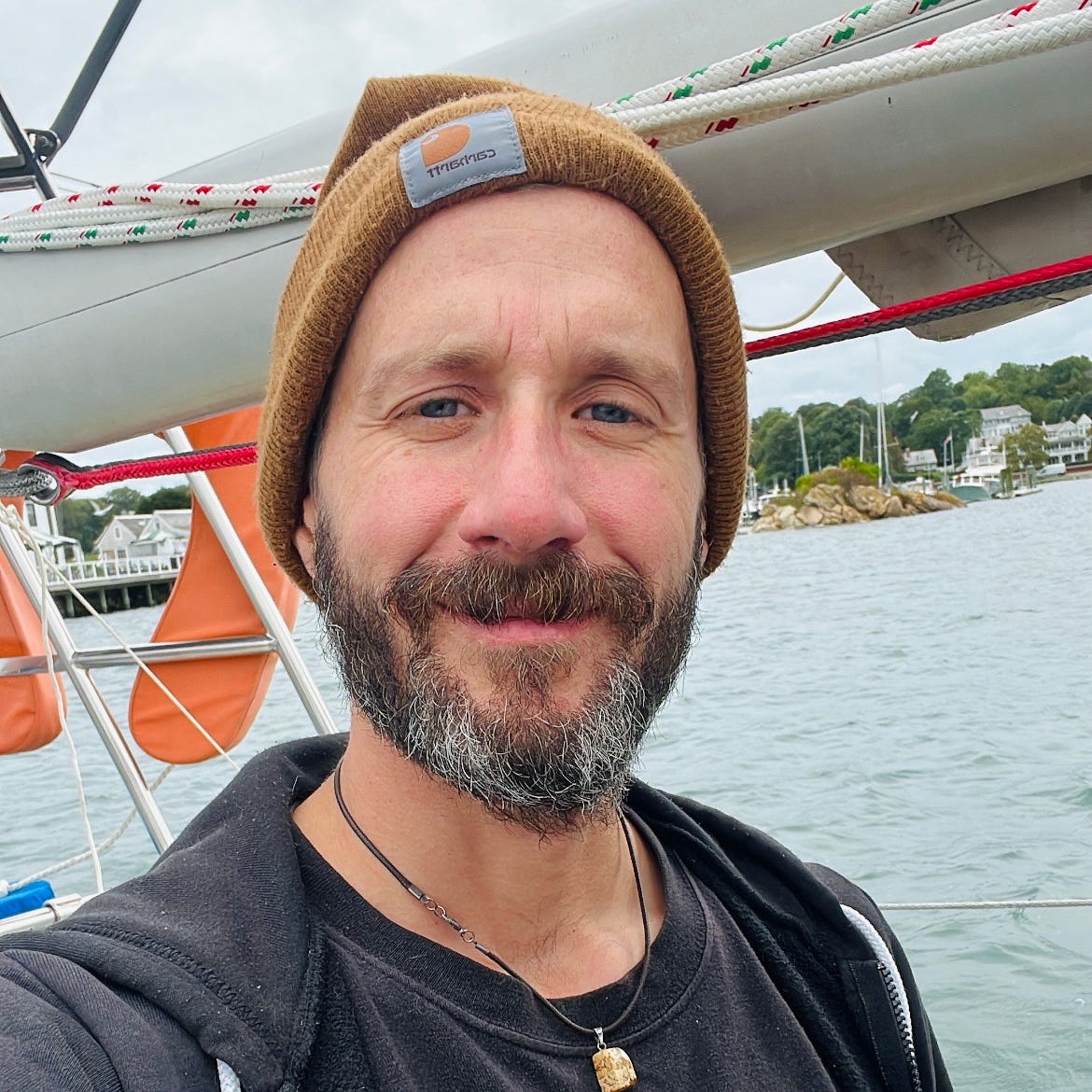 Author on sailboat in Newport