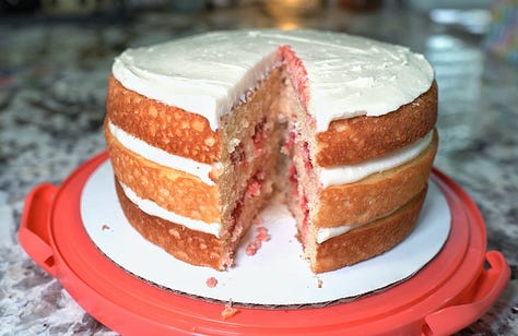 Naked 3-layer yellow cake with strawberry filling + cream cheese frosting