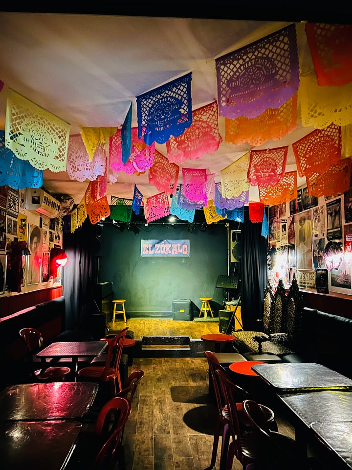 Scenes of a Parisian music venue called El Zokalo in the 20th arrondissment with a Mexican atmosphere and musicians performing