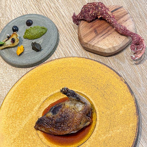 Three pigeon dishes at Paris restaurants A.T. Hemicycle and Maison