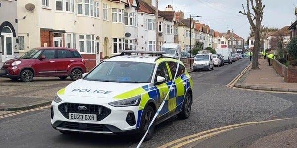 Police car next to scene cordon in Stadium Road, Southend