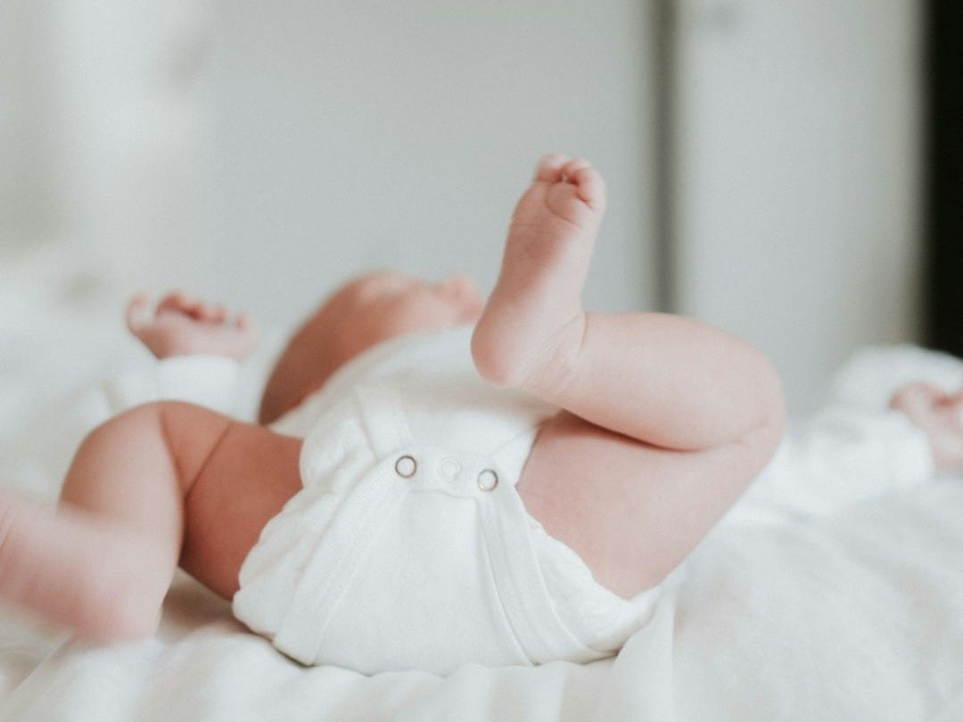 baby's white onesie baby's white onesie
