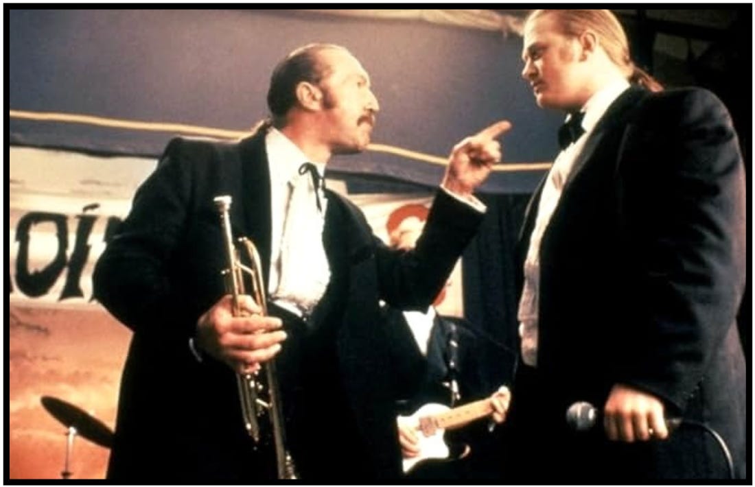 Joey The Lips points at Deco in anger in a scene from the movie, "The Commitments."