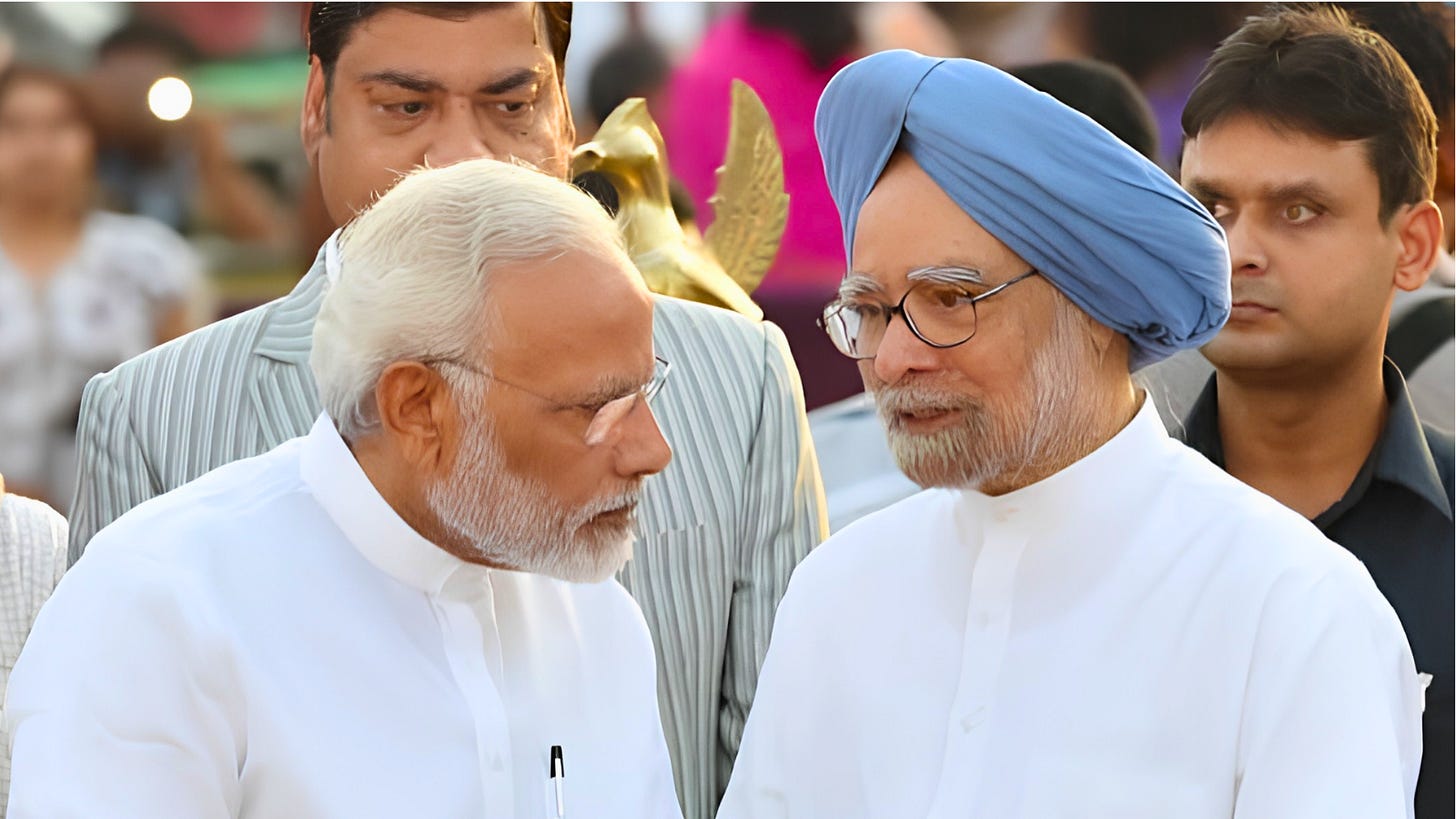 Former Prime Minister Manmohan Singh with Prime Minister Narendra Modi
