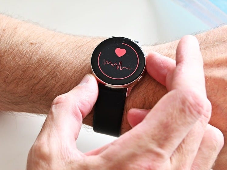 a person holding a stopwatch