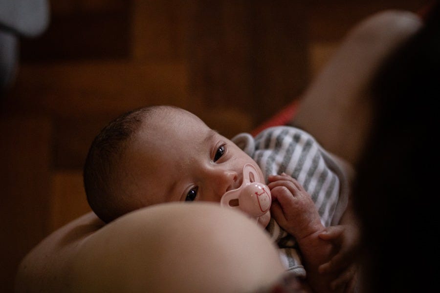 young baby with dummy young baby with dummy
